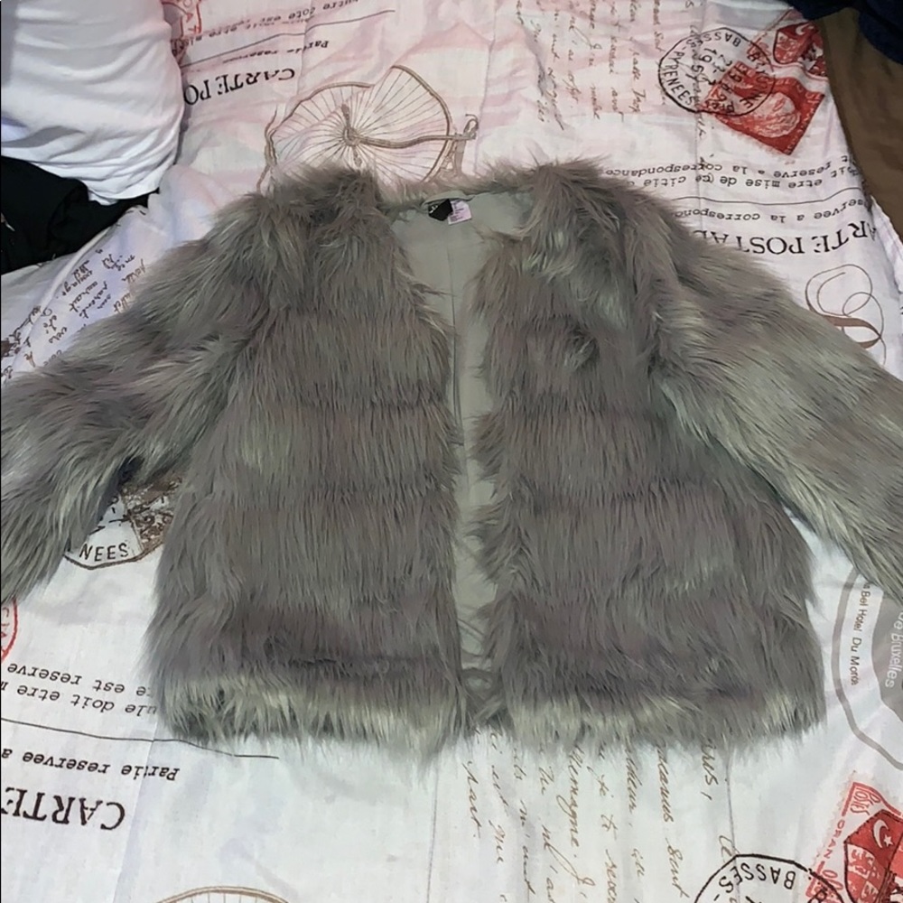 Fur coat.